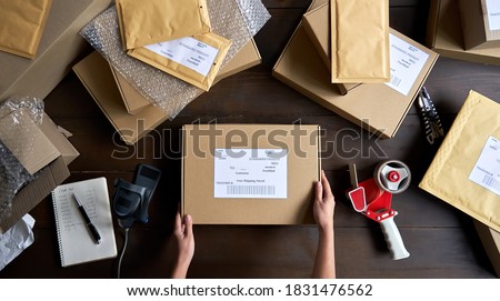 ストックフォト: Preparing Box For Sending