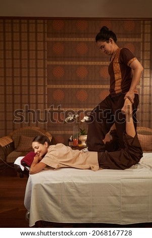 Stock photo: Foot Massage Technique Of Masseuse Lady Client