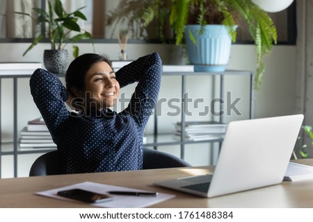 ストックフォト: Happy Business Woman In The Office Resting And Daydreaming Lots