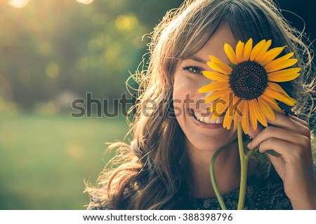 Stock photo: Pretty Girl With Sunflower