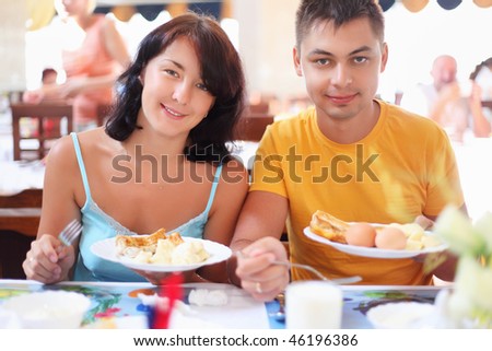 Foto stock: Married Couple Having Breakfast At Restaurant Have Control Over
