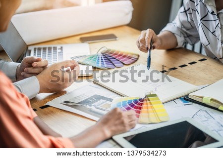 Stockfoto: Creative Interior Designer Discussing Project