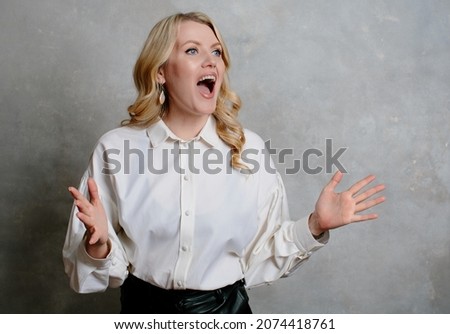 Stock photo: Pretty Woman Screams At The Top Of Her Lungs