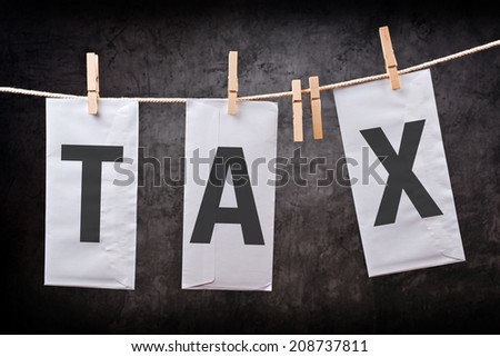 [[stock_photo]]: Three Tax Envelope On Clothes Rope