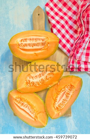 ストックフォト: Top View Of Four Slices Of Cantaloupe Melon On Table