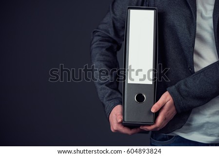 Stock foto: Businesswoman Holding Document Ring Binder With Blank Label As C