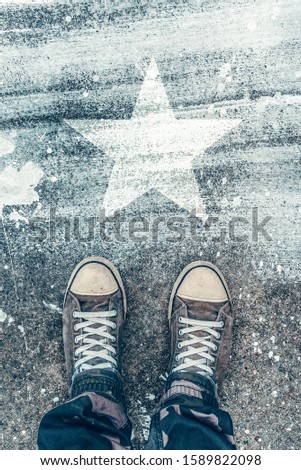 Foto stock: Talented Young Person On The Road With Star Shape Imprint