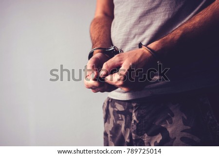 Foto stock: Handcuffed Soldier In Military Army Clothes
