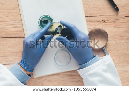 Stock photo: Overhead View Of Laboratory Technician Analyzing Petri Dish Bact