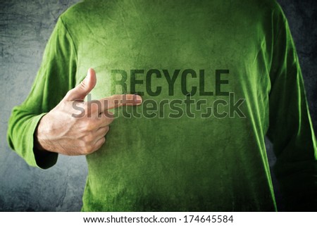 Foto stock: Recycle Man Pointing To Title Printed On His Shirt