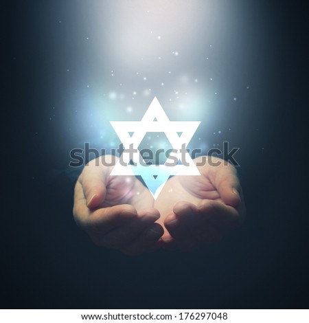 Stock photo: Female Hands Opening To Light And Davids Star