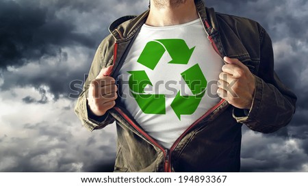 Stock fotó: Man Stretching Jacket To Reveal Shirt With Recycle Symbol Printe