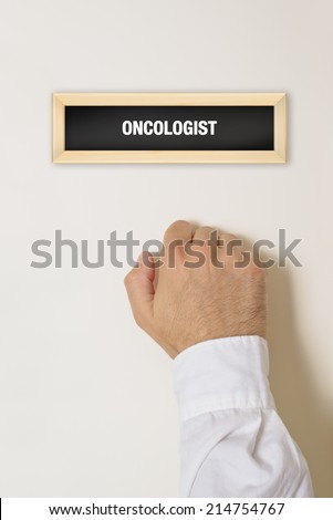 Stok fotoğraf: Male Patient Knocking On Oncologist Door