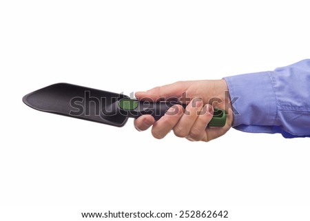 Foto d'archivio: Male Workers Hand Holding Plastic Garden Trowel