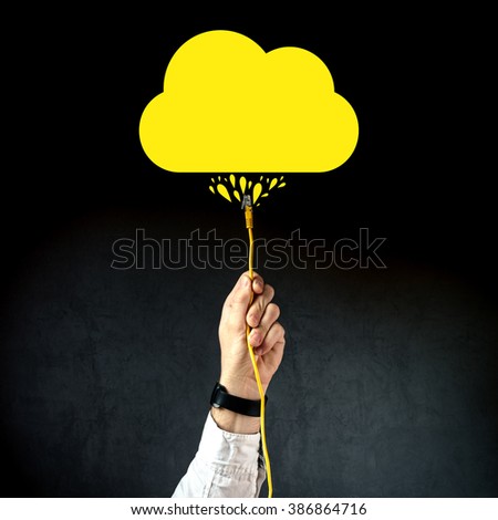 Foto stock: Businessman Plugging Lan Cable To Connect To Cloud Service