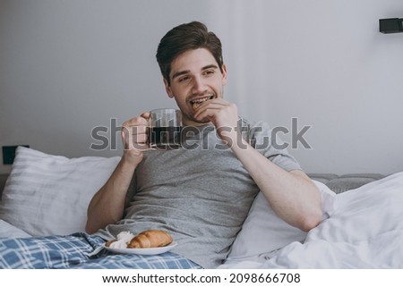 Foto stock: Model In Underwear Biting Chocolate