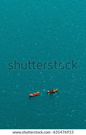 Foto stock: Unrecognizable People Enjoying Summer Afternoon In Boats On Lake