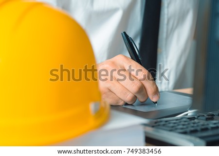 Stock photo: Architect Working With Sketch Pen Tablet And Cad Software