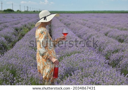 Beautiful Young Woman With A Glass Of Wine Over Abstract Blurred ストックフォト © mady70