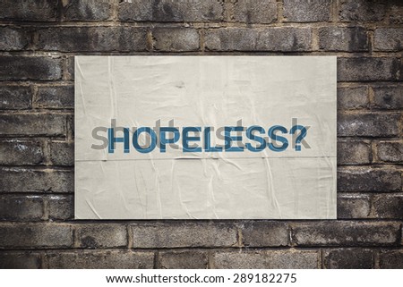 Foto stock: Hopeless On Rustic Poster Paper On Brick Wall