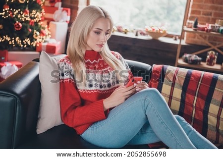 Stock photo: Lonely Woman Browsing Internet On Christmas Eve