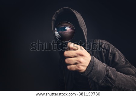 Stock foto: Bizarre Hooded Spooky Person With Magnifying Glass