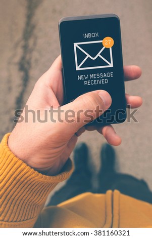 ストックフォト: Using Mobile Smartphone To Access E Mail Inbox