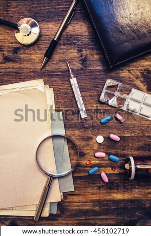 ストックフォト: Assorted Office Supplies On General Medical Practitioner Work De