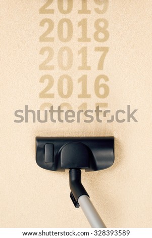 ストックフォト: Vacuum Cleaning 2016 From Carpet For Happy New 2017 Year