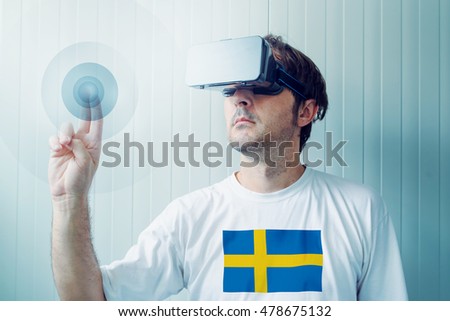 Stok fotoğraf: Swedish Man Exploring Virtual Reality Environment