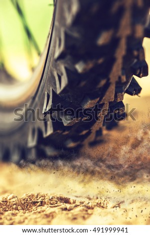 Stock fotó: Mountain Bike Wheel Close Up With Dirt Dust Particles