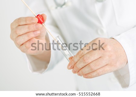 Foto stock: Female Gynecologist Holding Disposable Cervical Sample Swab