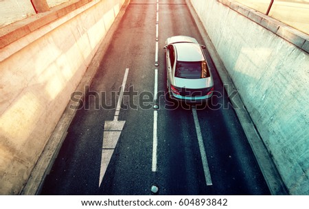 Сток-фото: Aerial View Of White Car Exiting Underground Garage