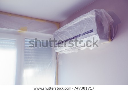 ストックフォト: Air Conditioner Unit Wrapped Up In Plastic Sheet
