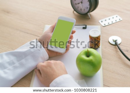 ストックフォト: Doctor Advising Apple Instead Of Pills And Antibiotics