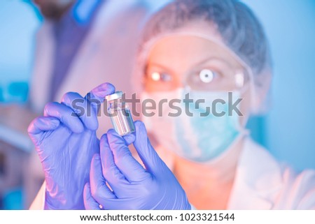 [[stock_photo]]: Doctor And Nurse Analyzing Unknown Mmr Vaccine