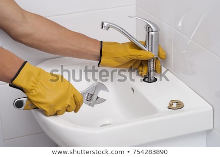 ストックフォト: Worker Fixing Water Tap