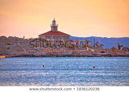 Сток-фото: Makarska Lighthouse And Stone Coastline Idyllic Sunset View