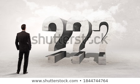 Foto stock: Rear View Of A Businessman Standing In Front Abbreviation