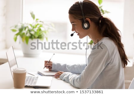 Zdjęcia stock: Woman With Headset On Laptop