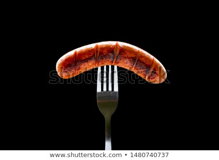 Stock photo: Grilled Sausage On A Fork Isolated On White Background