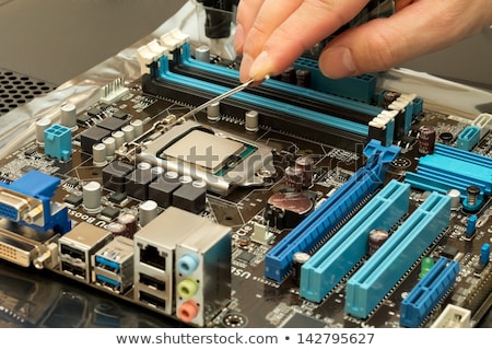 Stok fotoğraf: Installing Central Processor Unit Into Motherboard