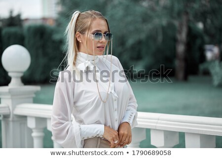 Stok fotoğraf: Fashion Man Posing Outdoor With His Shirt Open