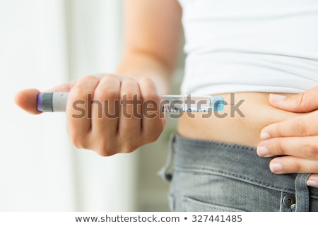 ストックフォト: Woman With Syringe Making Insulin Injection