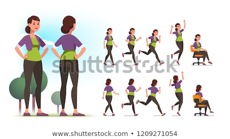 Foto stock: Back View Of A Young Sportswoman Posing With Hands Raised