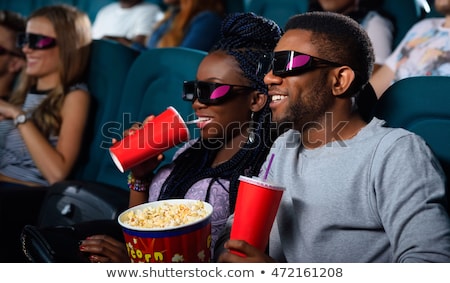 Stok fotoğraf: Lovely Couple Watching 3d Movie