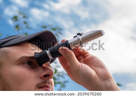 Stock fotó: Determined Man Looking At A Wine Glass