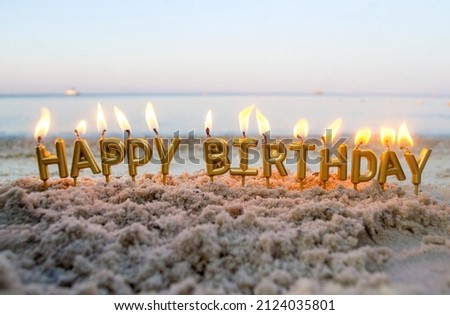 [[stock_photo]]: Birthday Candles Burning On A Seashore