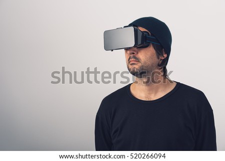 ストックフォト: Male Actor In Virtual Reality Environment Wearing Vr Goggles