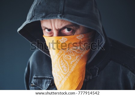 Zdjęcia stock: Hooded Gang Member Criminal With Scarf Over Face